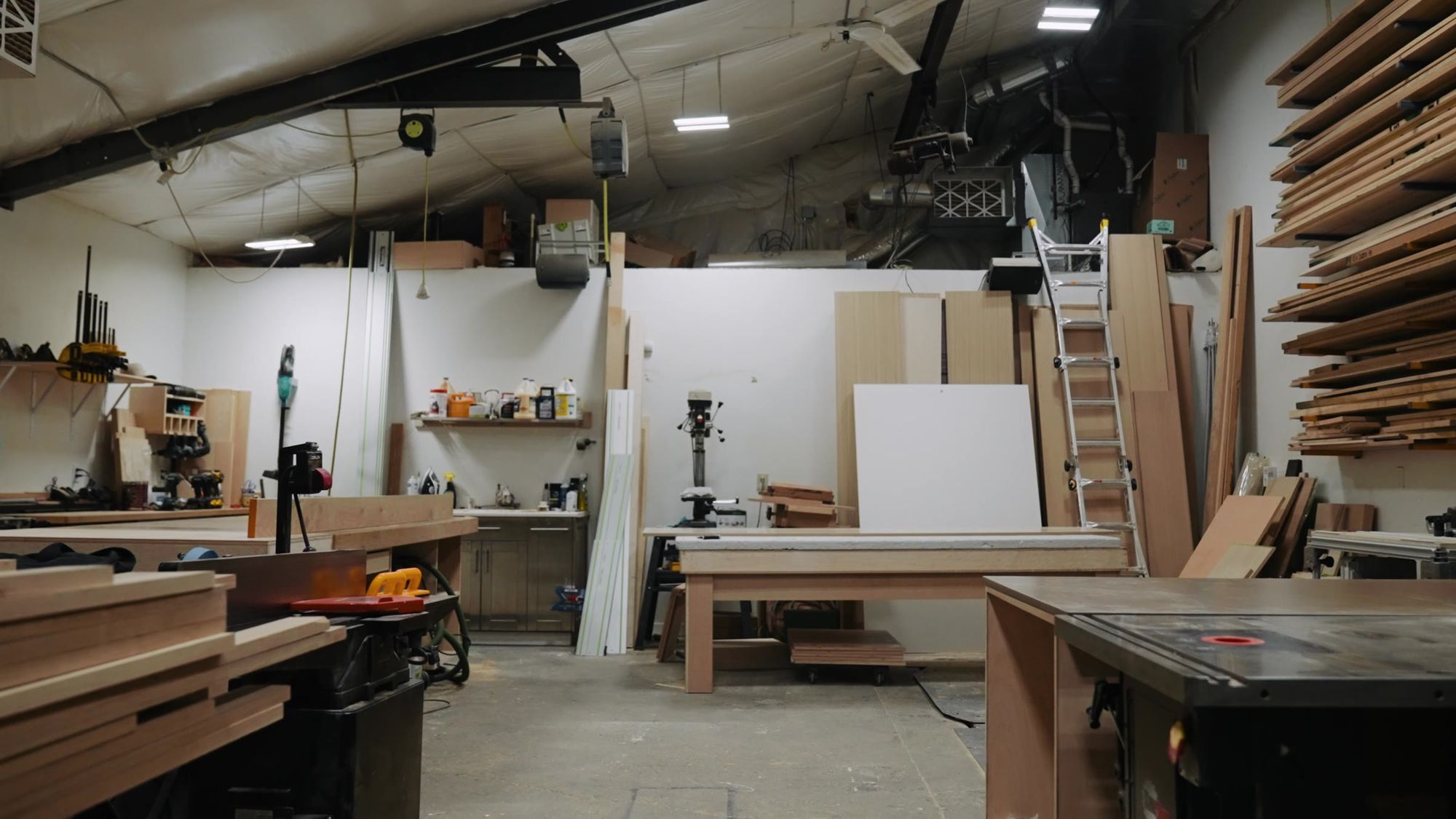 The Krafted Woodworking shop: benches, saws and lumber racks